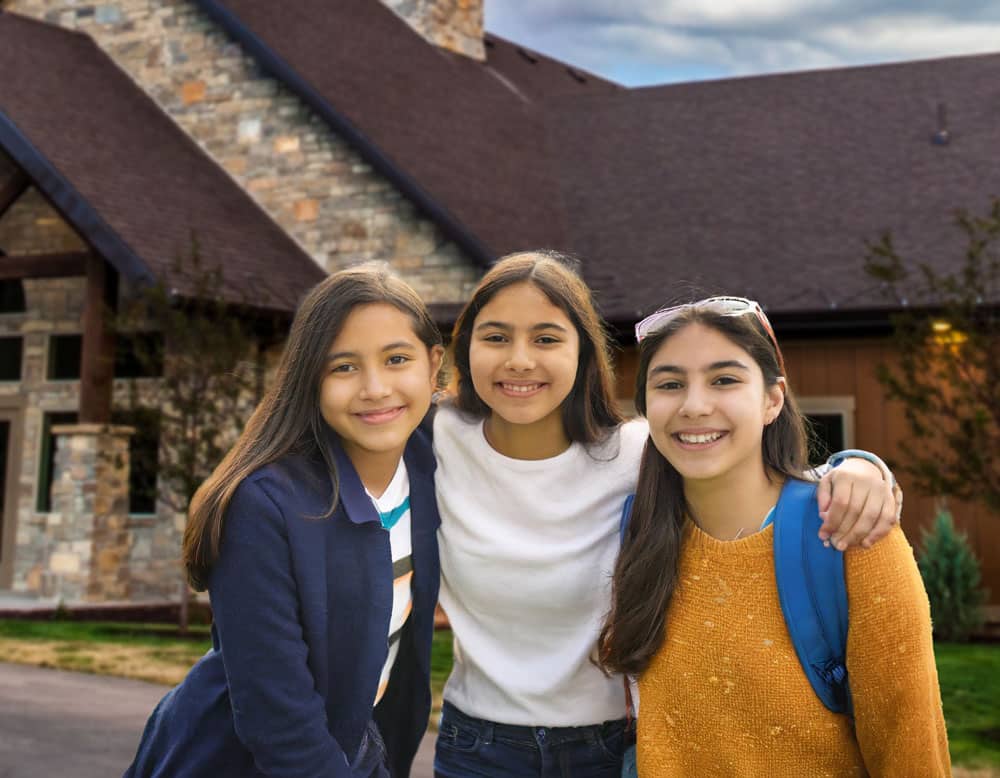 Happy-teenage-girls-and-friends-out-having-fun-on-an-spring-day